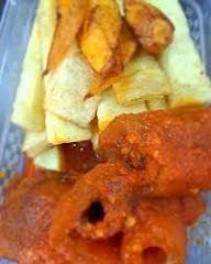 Fried yam sauce with Kponmo